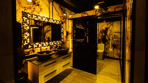 Baroque mirrors and golden marble, down to the last corner.